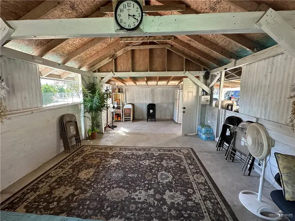a view of swimming pool with outdoor seating