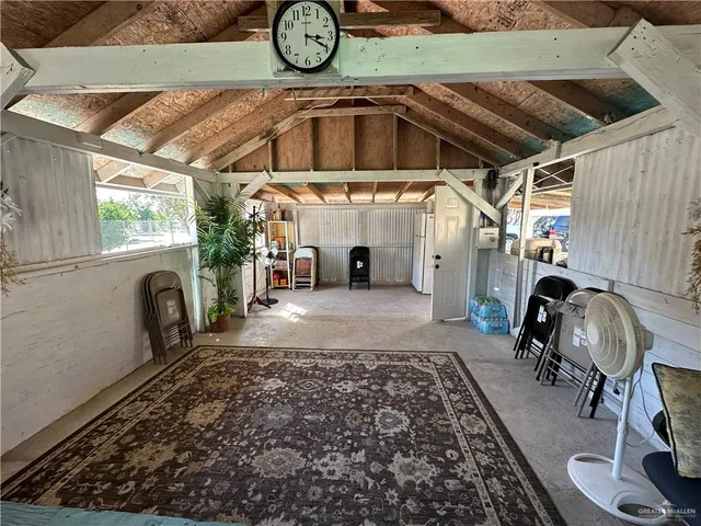 a view of swimming pool with outdoor seating