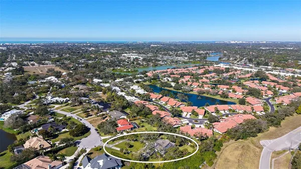 an aerial view of a house with a outdoor space