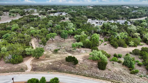 an aerial view of residential house with outdoor space