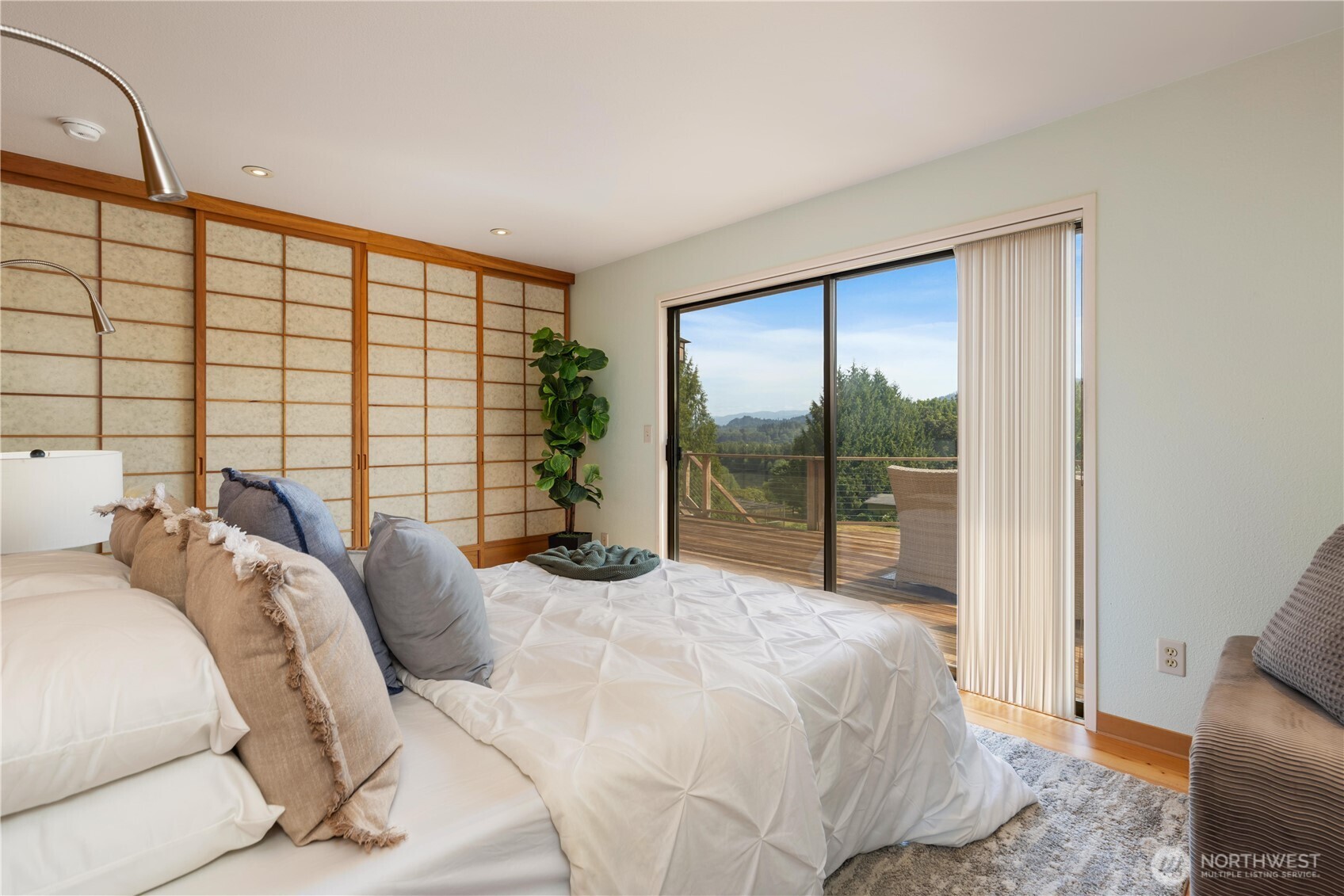 22212 High Bridge Road Monroe, WA 98272 - Photo 14 of 34 a bedroom with a large bed and a large window