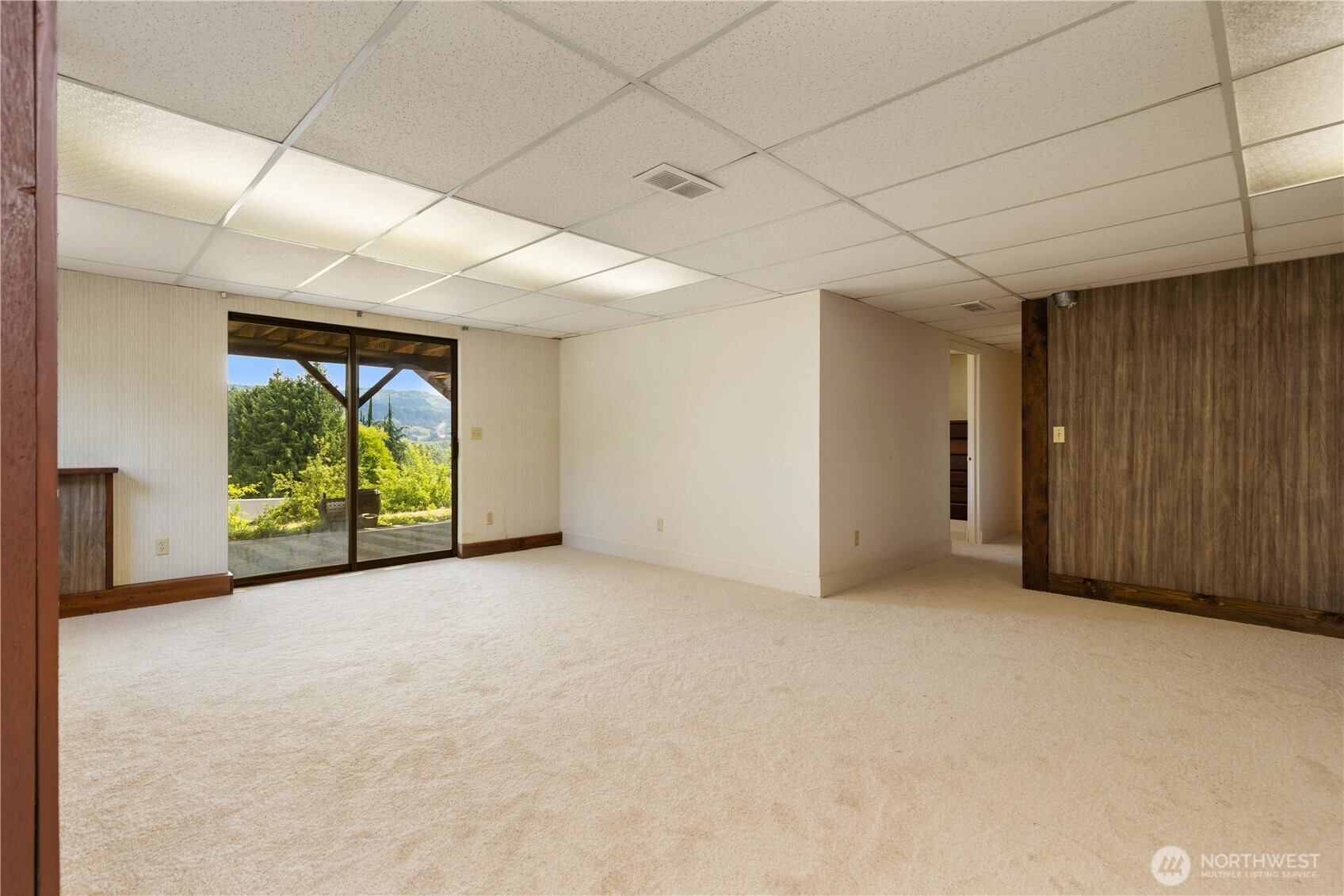 22212 High Bridge Road Monroe, WA 98272 - Photo 19 of 34 a view of a room with large windows
