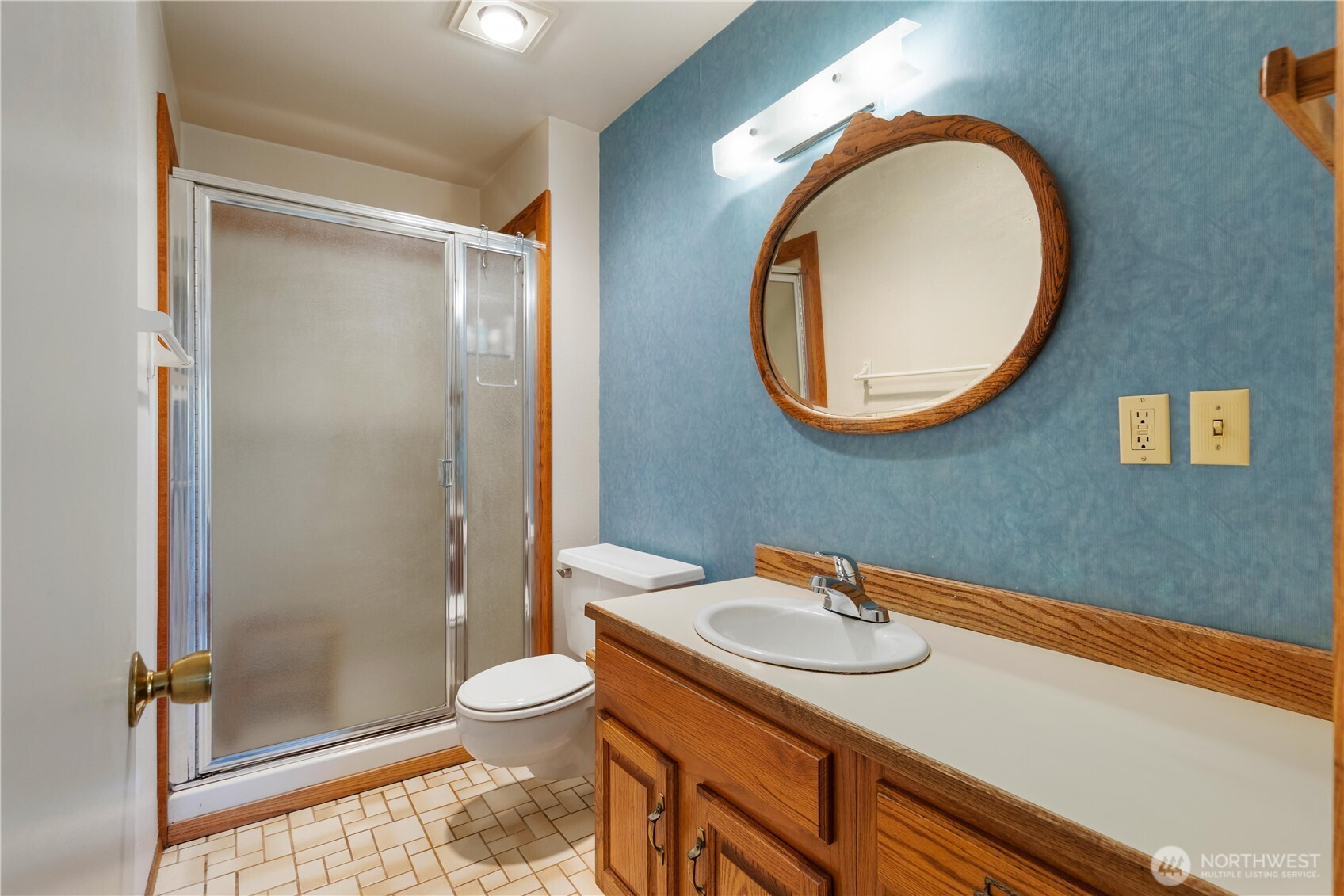 22212 High Bridge Road Monroe, WA 98272 - Photo 22 of 34 a bathroom with a sink a toilet and shower