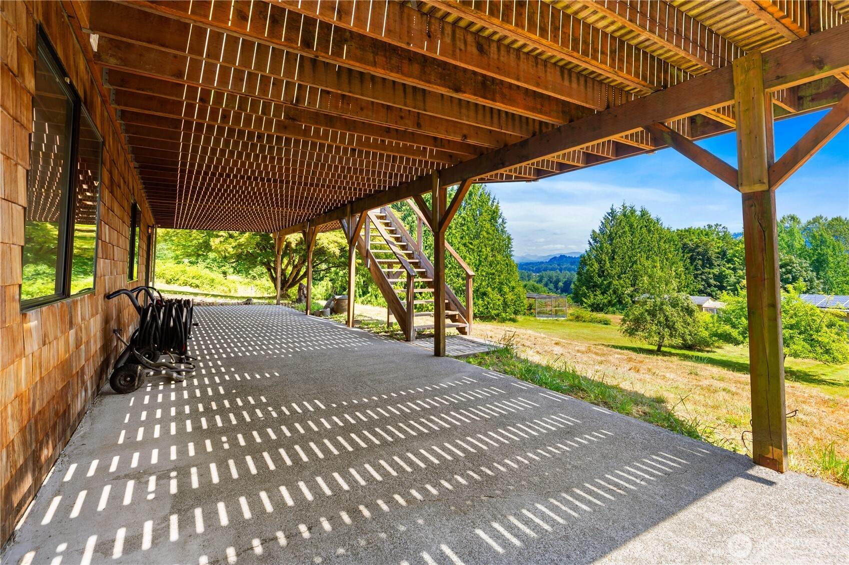 22212 High Bridge Road Monroe, WA 98272 - Photo 27 of 34 a view of patio with wooden floor