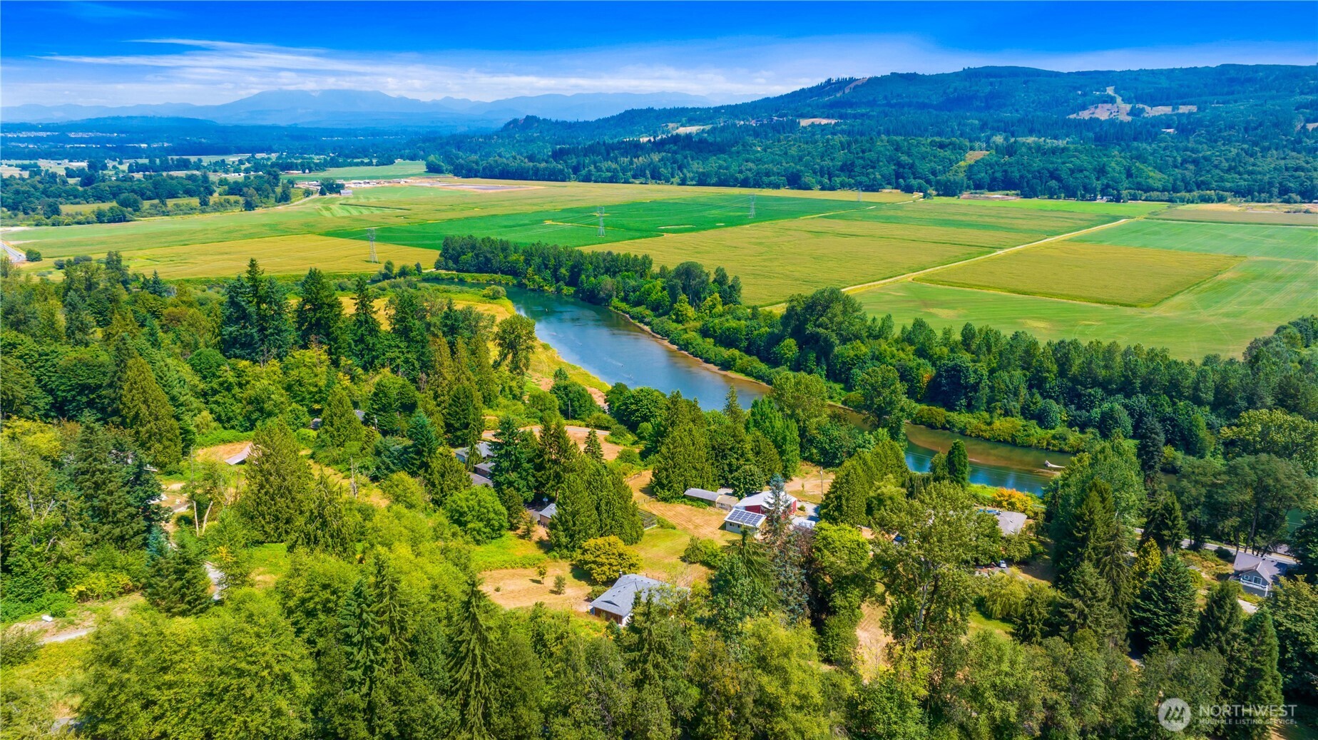 22212 High Bridge Road Monroe, WA 98272 - Photo 31 of 34 a view of a lush green hillside and houses