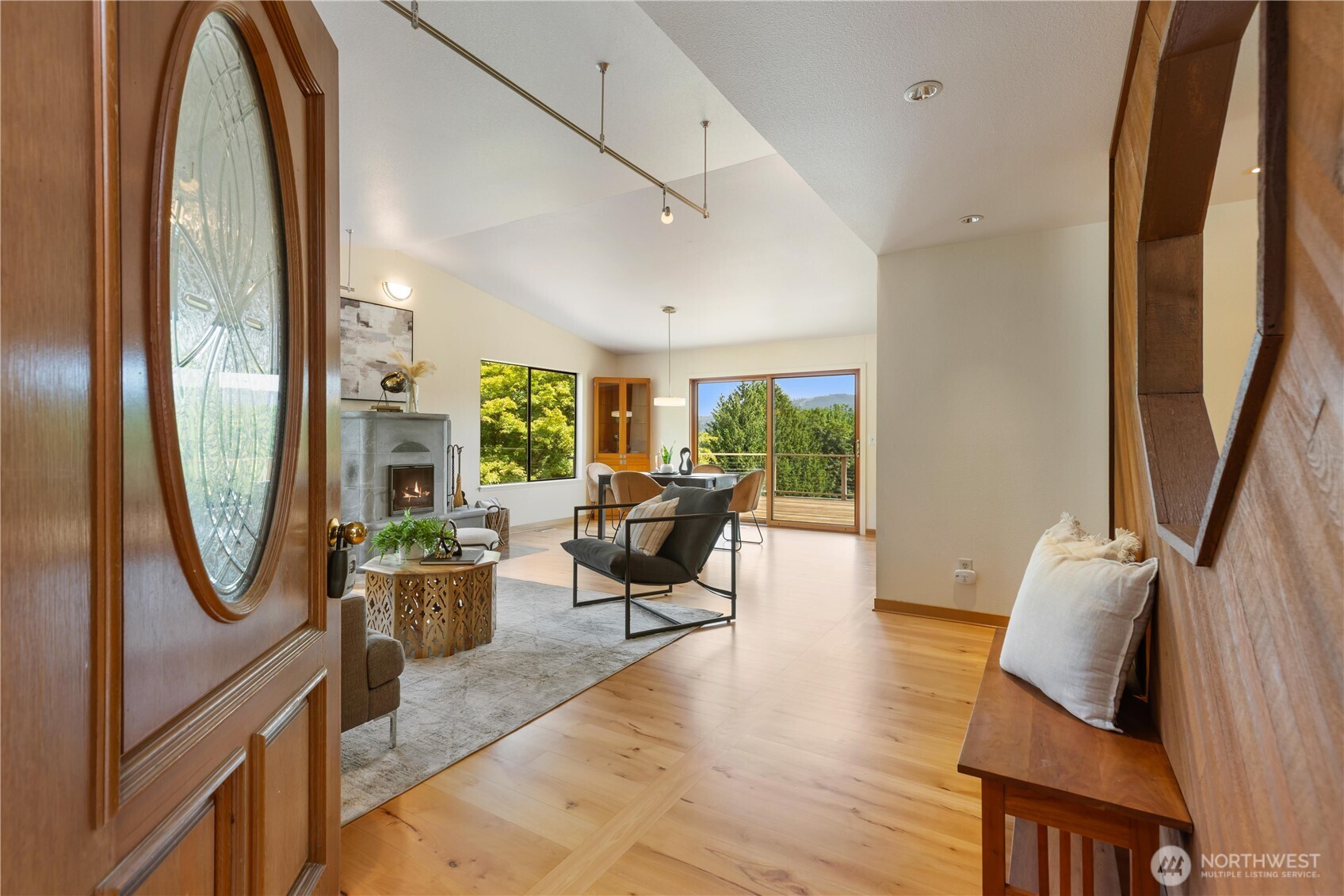 22212 High Bridge Road Monroe, WA 98272 - Photo 5 of 34 a living room with furniture floor to ceiling window and wooden floor