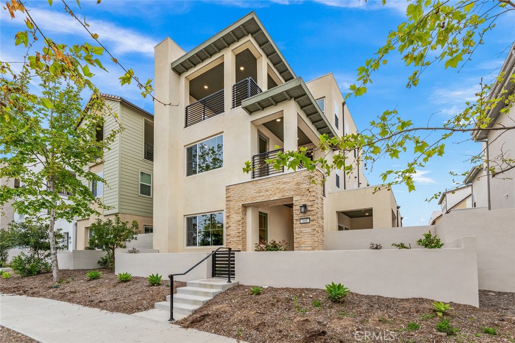a front view of a multi story residential apartment building