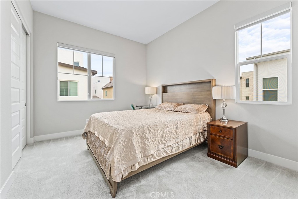 168 Perspective Irvine, CA 92618 - Photo 20 of 49 a bed sitting in a bedroom next to a window