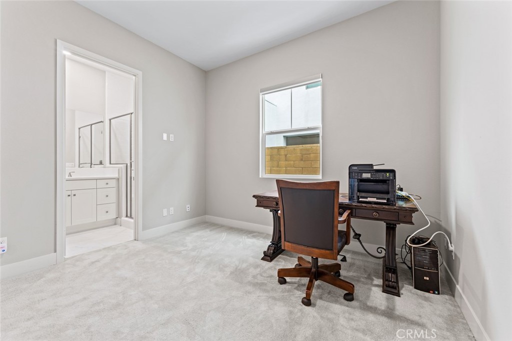 168 Perspective Irvine, CA 92618 - Photo 21 of 49 a view of a workspace with furniture and a window