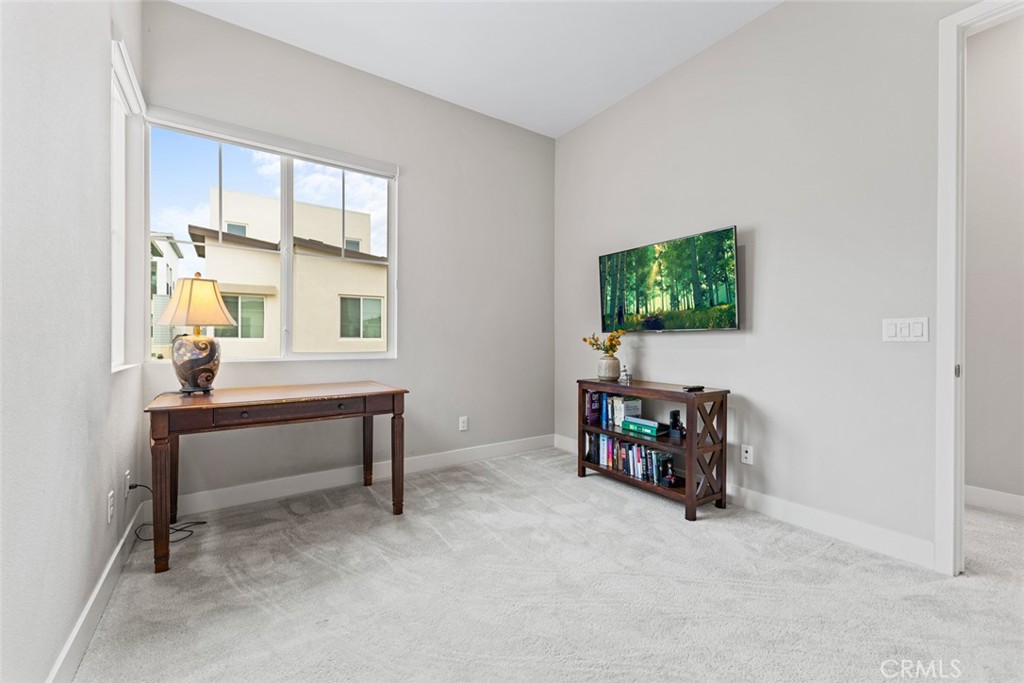 168 Perspective Irvine, CA 92618 - Photo 23 of 49 a living room with furniture and a flat screen tv