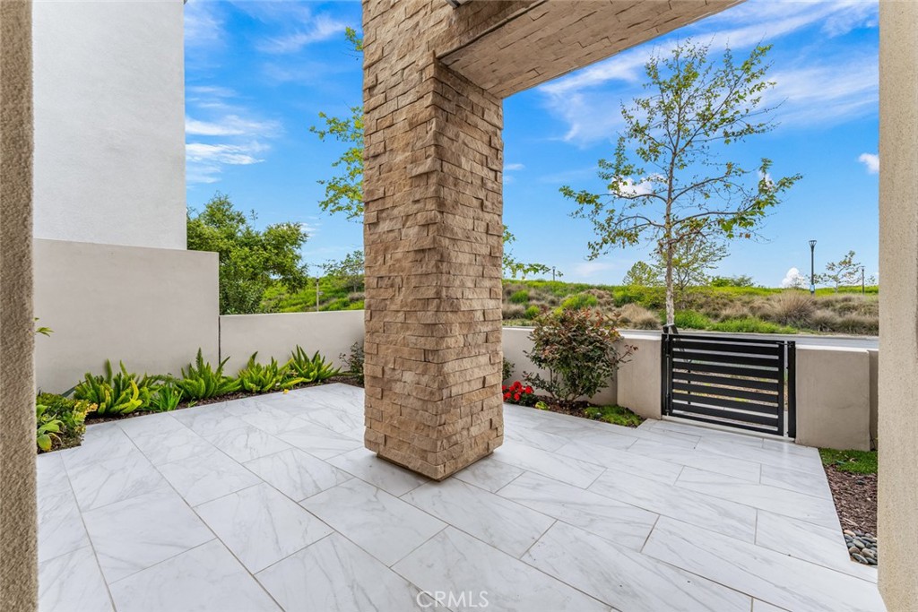 168 Perspective Irvine, CA 92618 - Photo 34 of 49 a view of a pathway with a tree