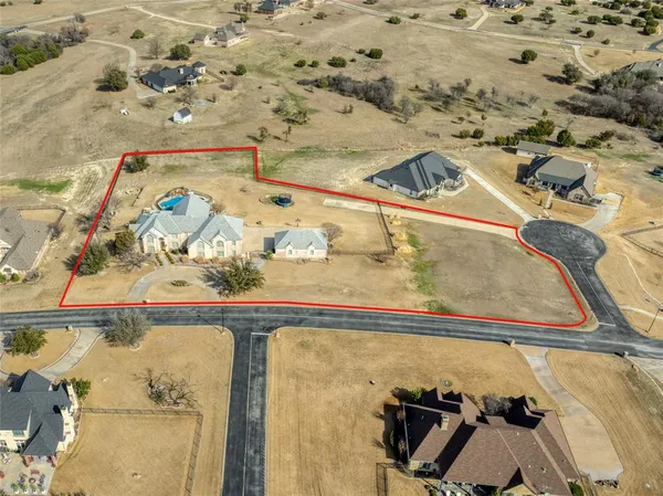 an ocean view with a table and chairs