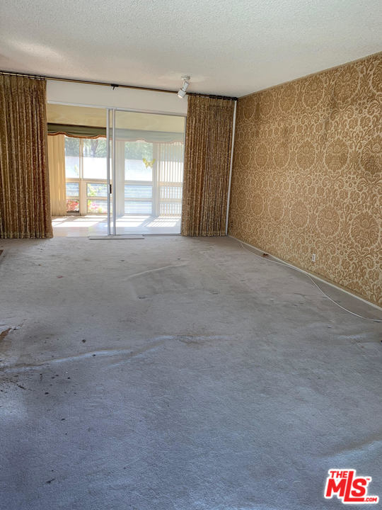 2425 Crest View Drive Los Angeles, CA 90046 - Photo 2 of 14 a view of an empty room with a window
