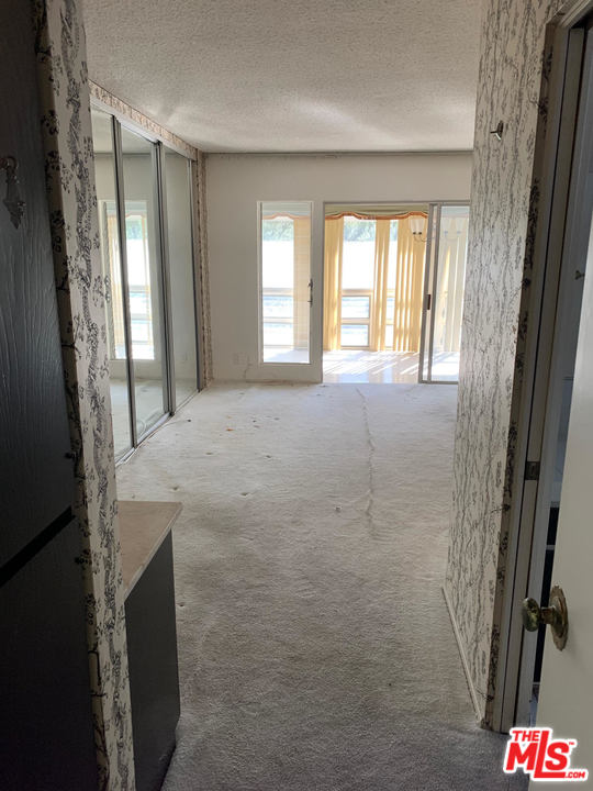 2425 Crest View Drive Los Angeles, CA 90046 - Photo 8 of 14 a bathroom with a bathtub and a shower