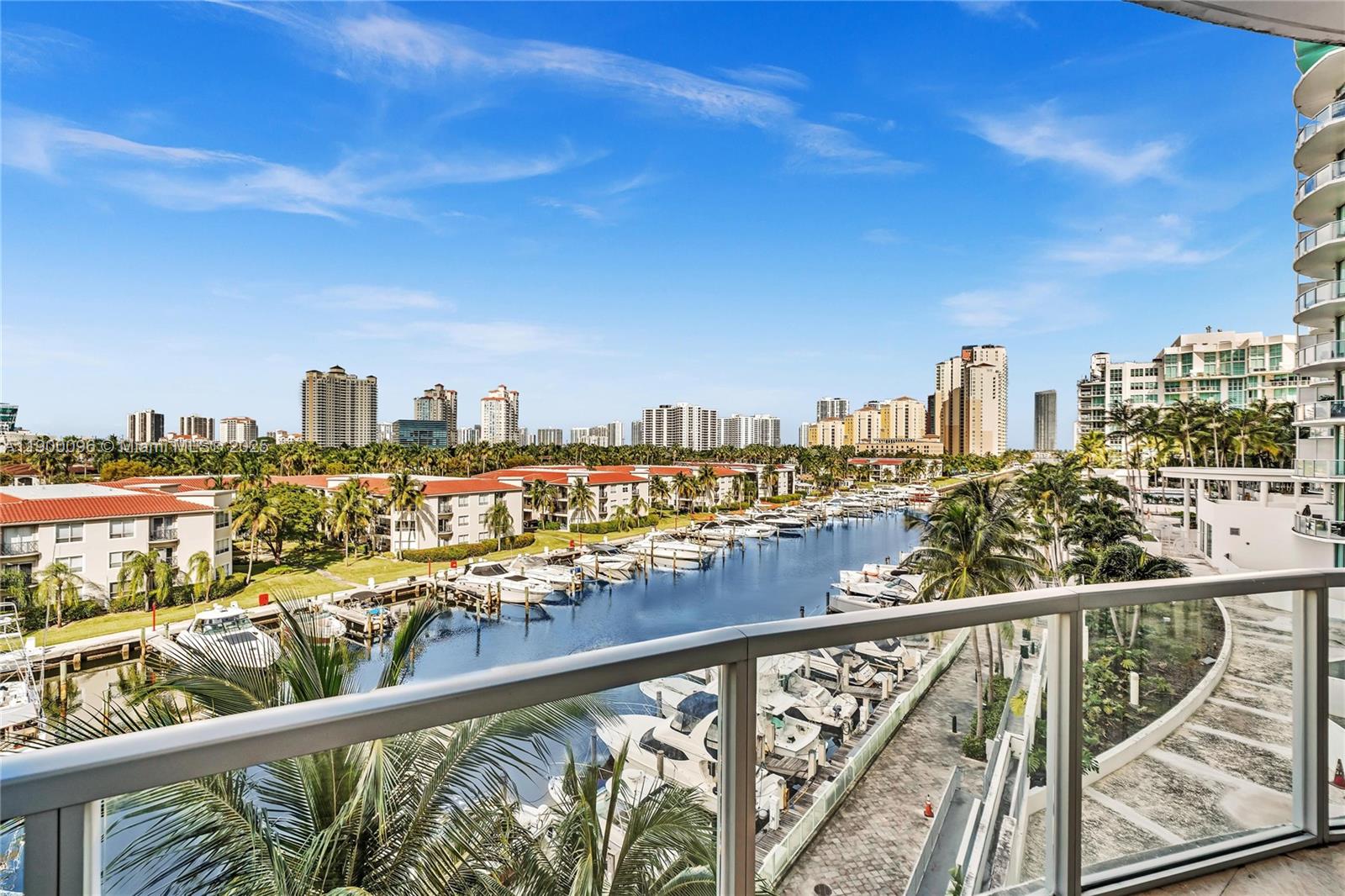 3029 Northeast 188th Street, Unit 503 Aventura, FL 33180 - Photo 22 of 60 a view of city from a balcony