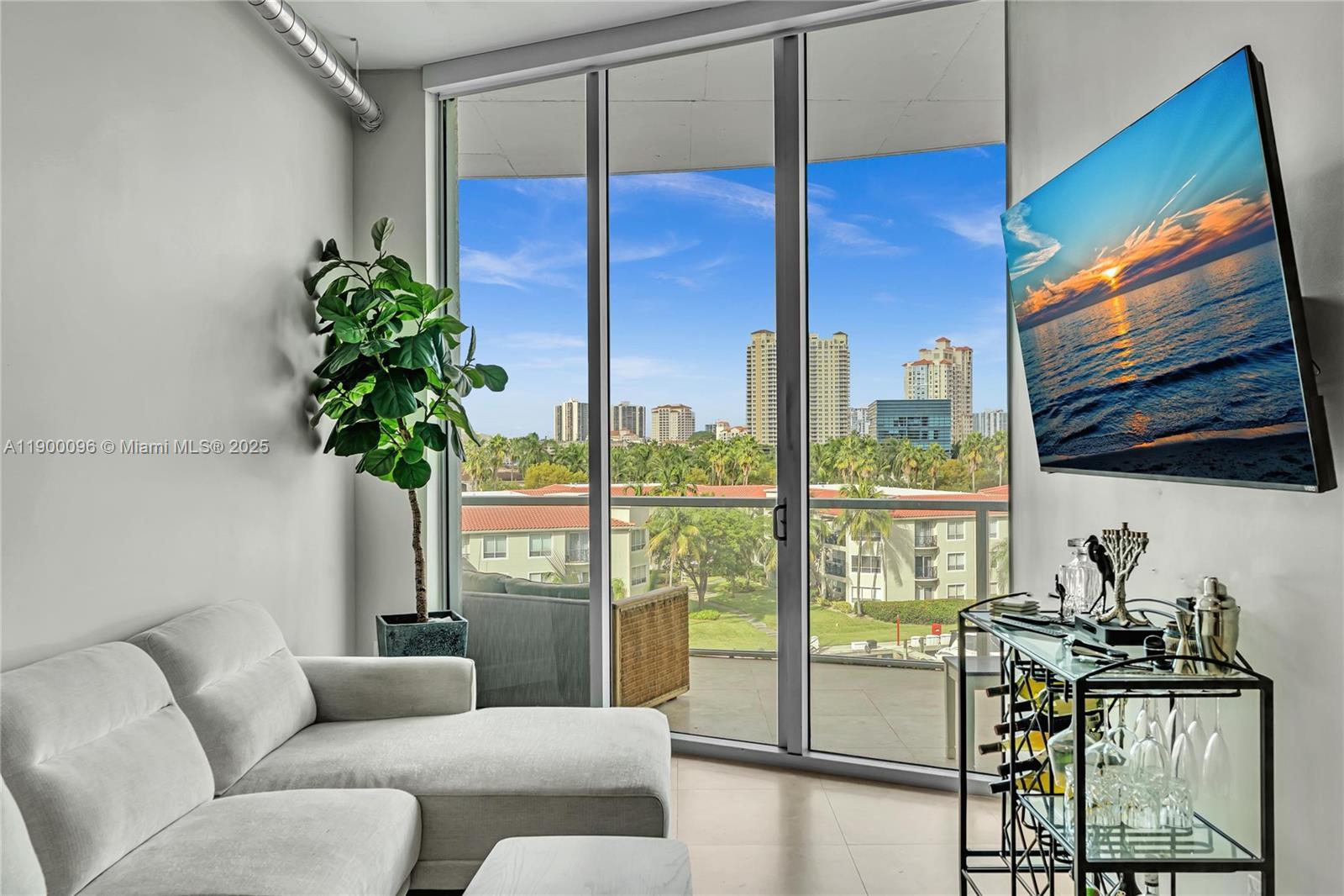 3029 Northeast 188th Street, Unit 503 Aventura, FL 33180 - Photo 27 of 60 a living room with furniture