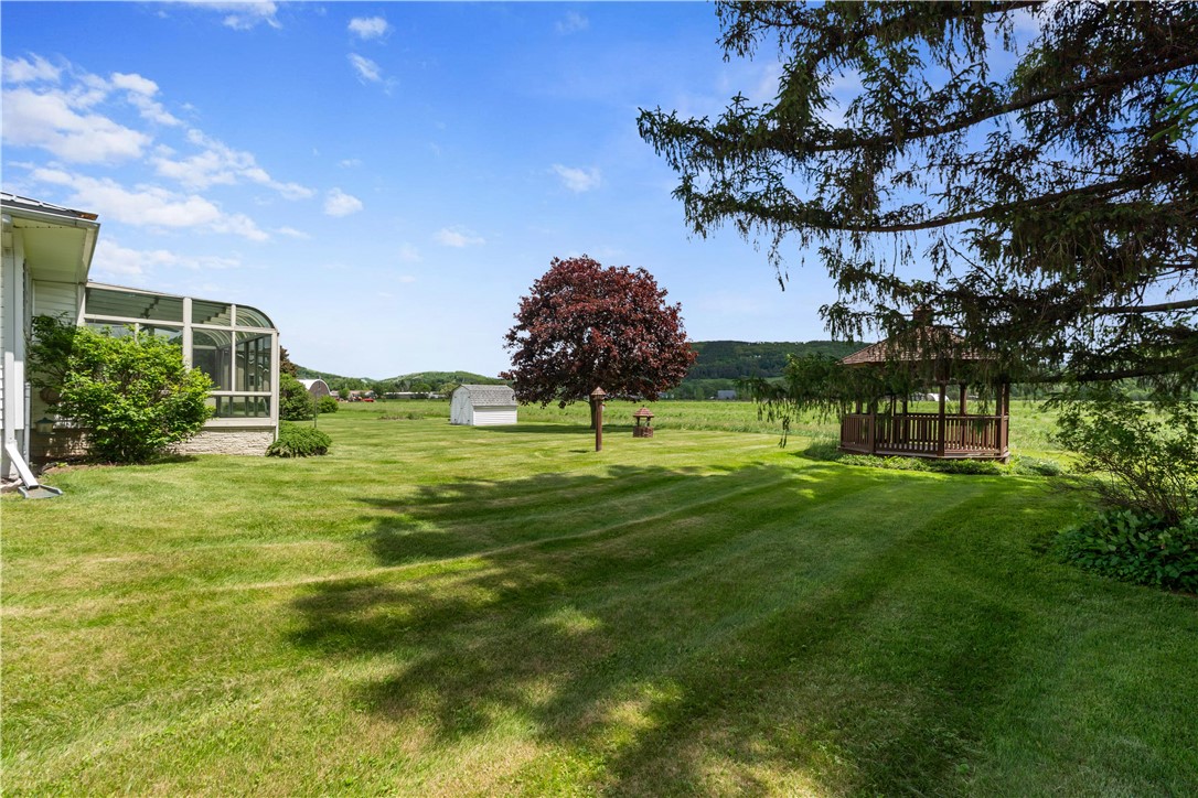 94 South Main Street Avoca, NY 14809 - Photo 41 of 48 Expansive flat yard with a shed and gazebo