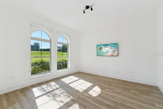 a view of staircase with lots of windows and walls