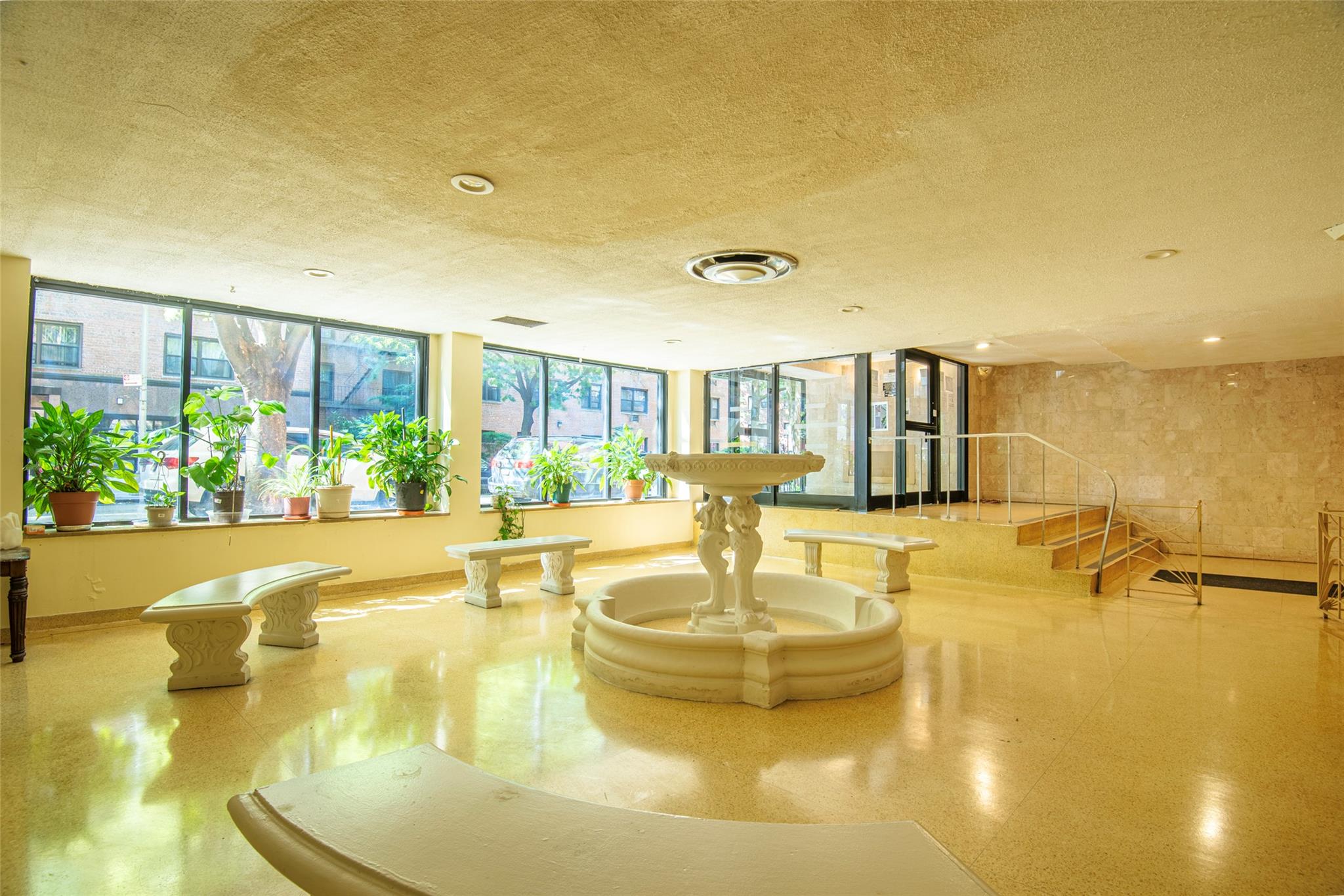 99-35 59th Avenue, Unit 4K Queens, NY 11368 - Photo 5 of 24 Lobby featuring a textured ceiling and recessed lighting