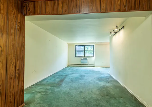 a view of a room that has a window in it