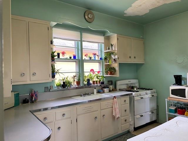 4021 Avenue R Brooklyn, NY 11234 - Photo 17 of 20 a kitchen with a sink cabinets and window