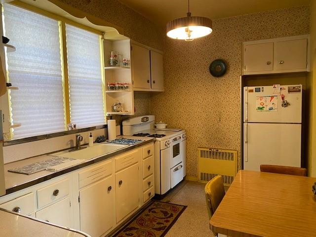 4021 Avenue R Brooklyn, NY 11234 - Photo 6 of 20 a kitchen with cabinets and appliances