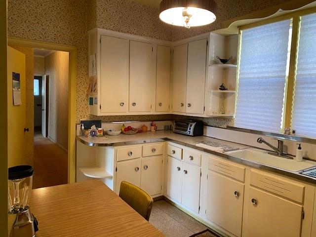 4021 Avenue R Brooklyn, NY 11234 - Photo 7 of 20 a bathroom with a sink and mirror
