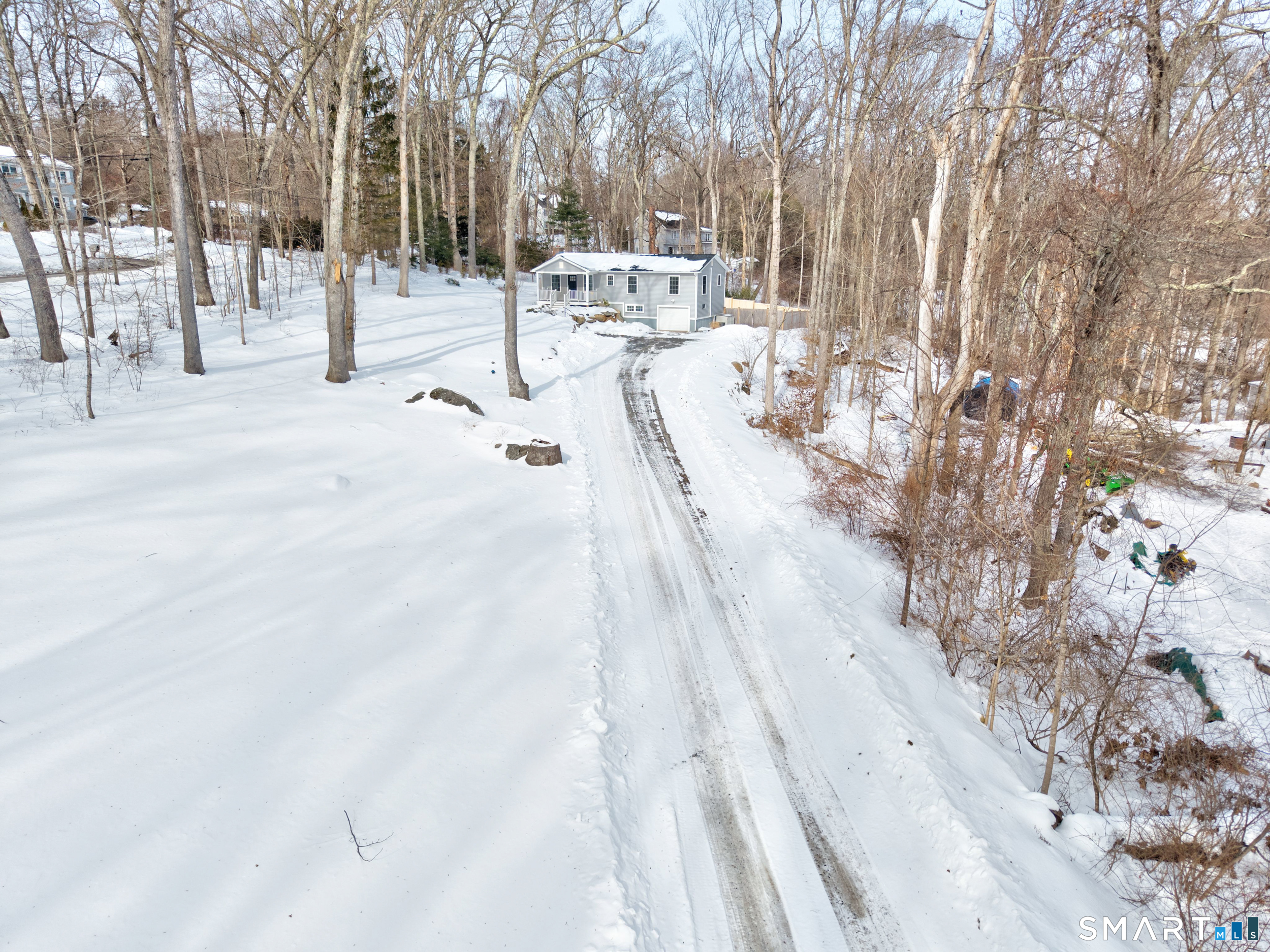 8 Egypt Lane Clinton, CT 06413 - Photo 28 of 33 8 Egypt is set back from the road, sitting on a 1.14 acre lot, offering privacy and lovely curb appeal.