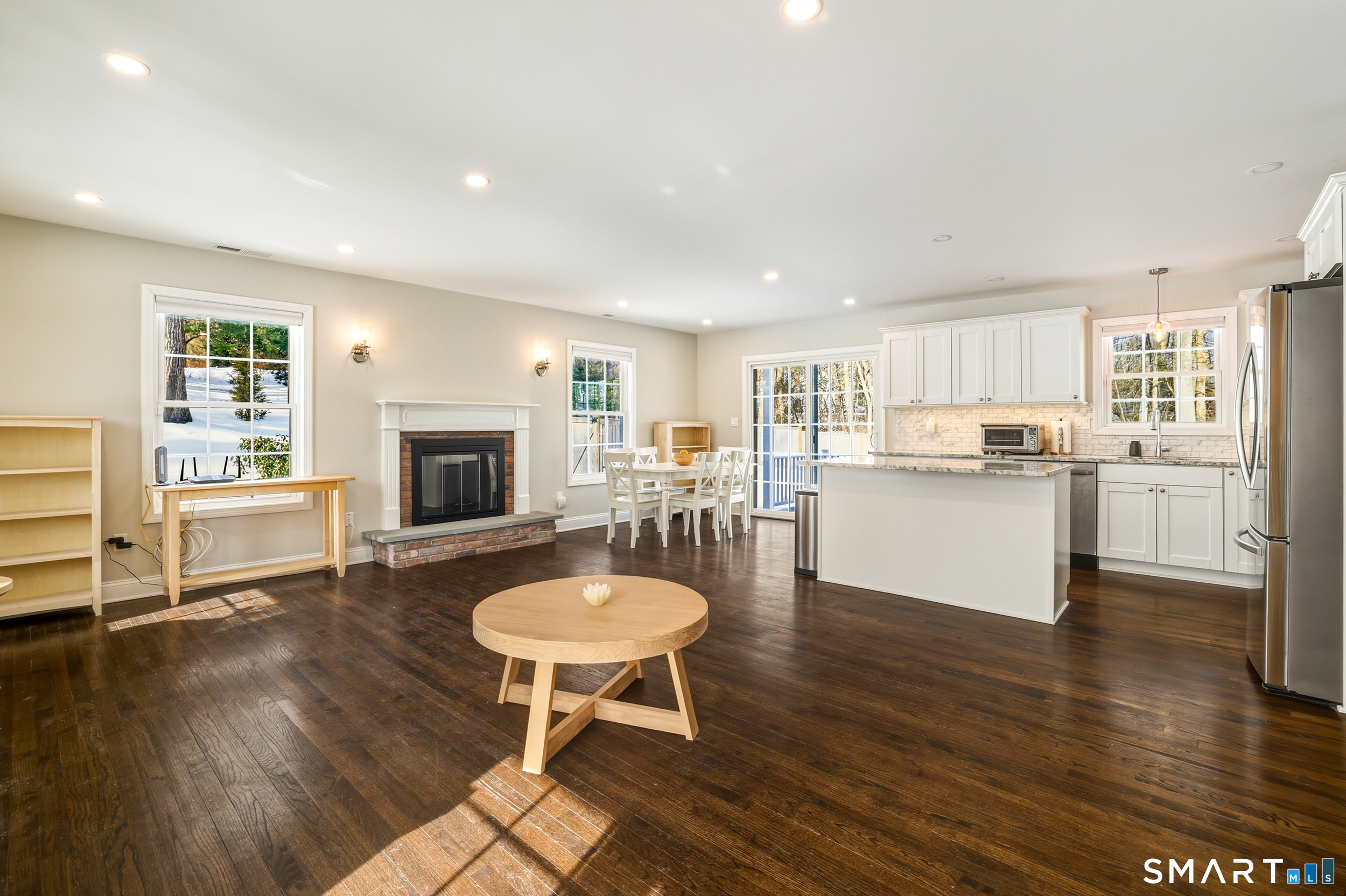 8 Egypt Lane Clinton, CT 06413 - Photo 31 of 33 Enjoy one floor living in this open floor plan with light-filled interior spaces, recessed lighting, and hardwood flooring throughout.