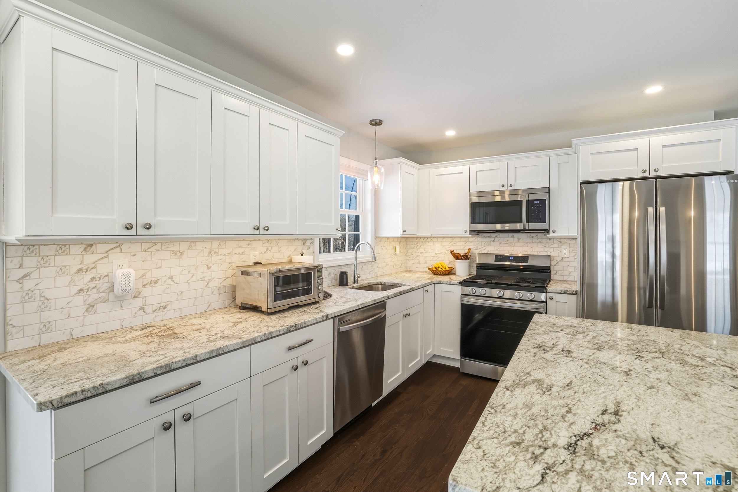 8 Egypt Lane Clinton, CT 06413 - Photo 6 of 33 Center island offers seating and added storage space.