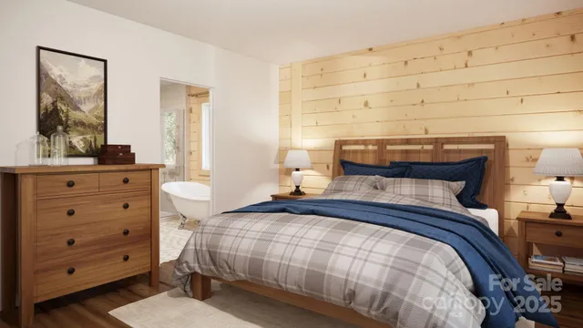 a bedroom with a bed and a dresser