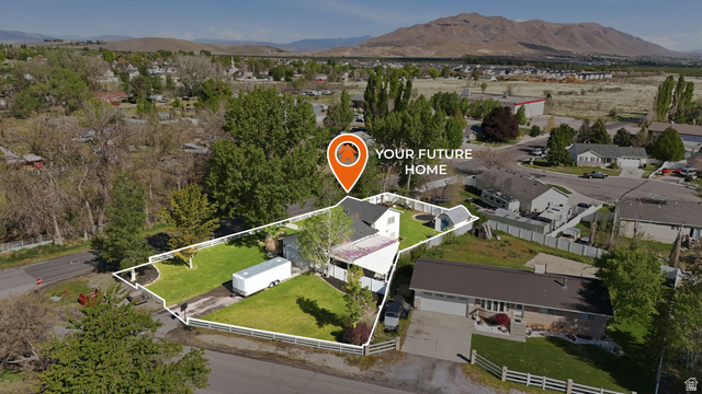 415 East 400 North Santaquin, UT 84655 - Photo 38 of 39 Single-story residence featuring a white exterior and dark roof