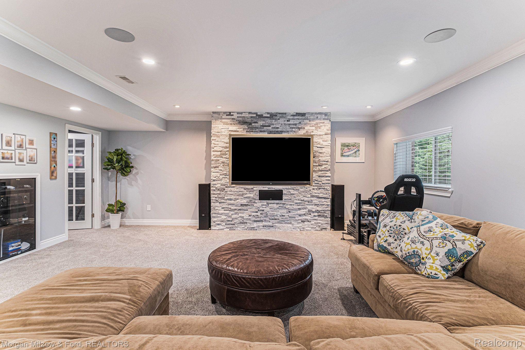 6941 Oakhurst Ridge Road Clarkston, MI 48348 - Photo 38 of 59 Lower level family room ripe for large gatherings