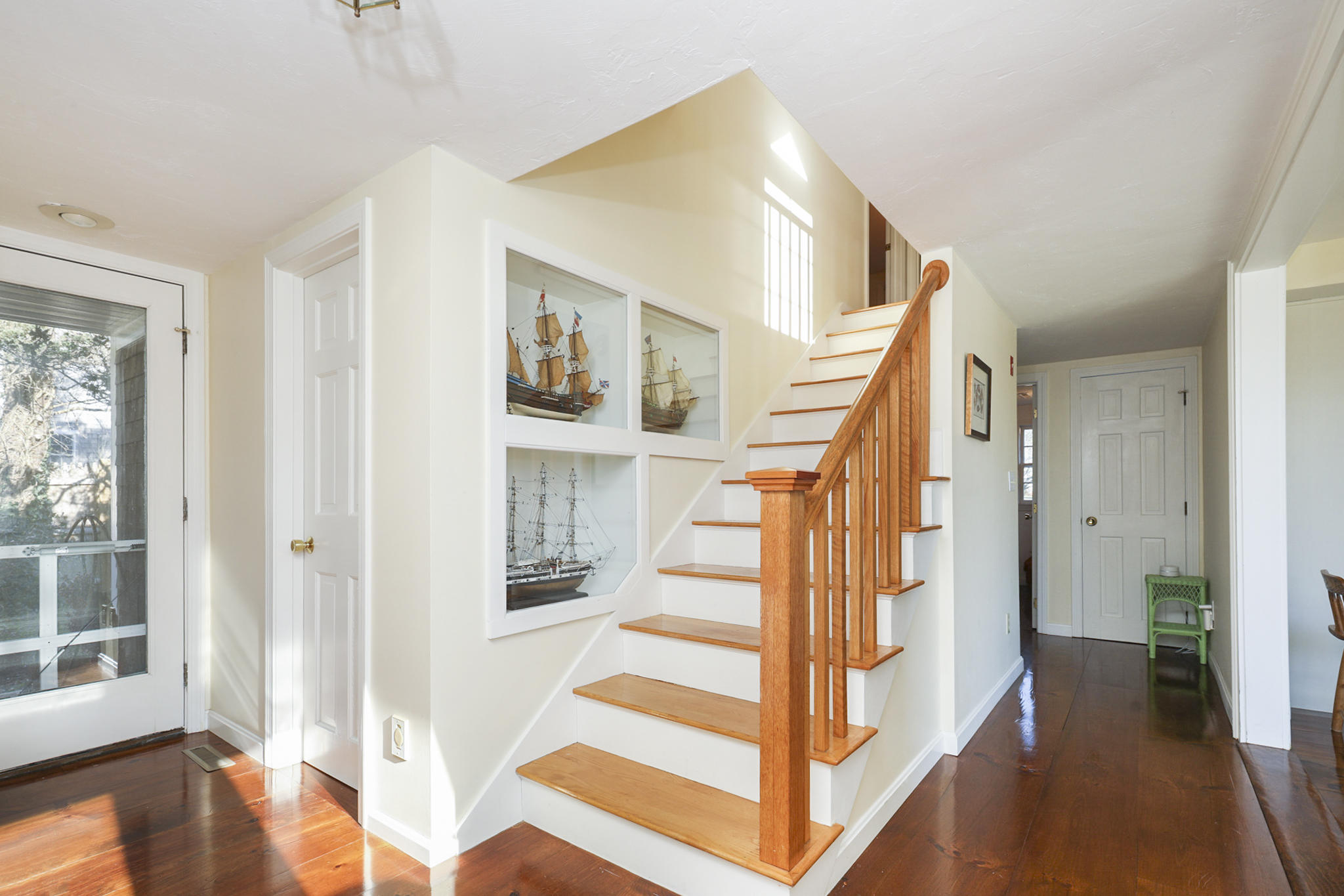 145 Barley Neck Road Orleans, MA 02653 - Photo 14 of 39 a view of entryway with wooden floor and stairs