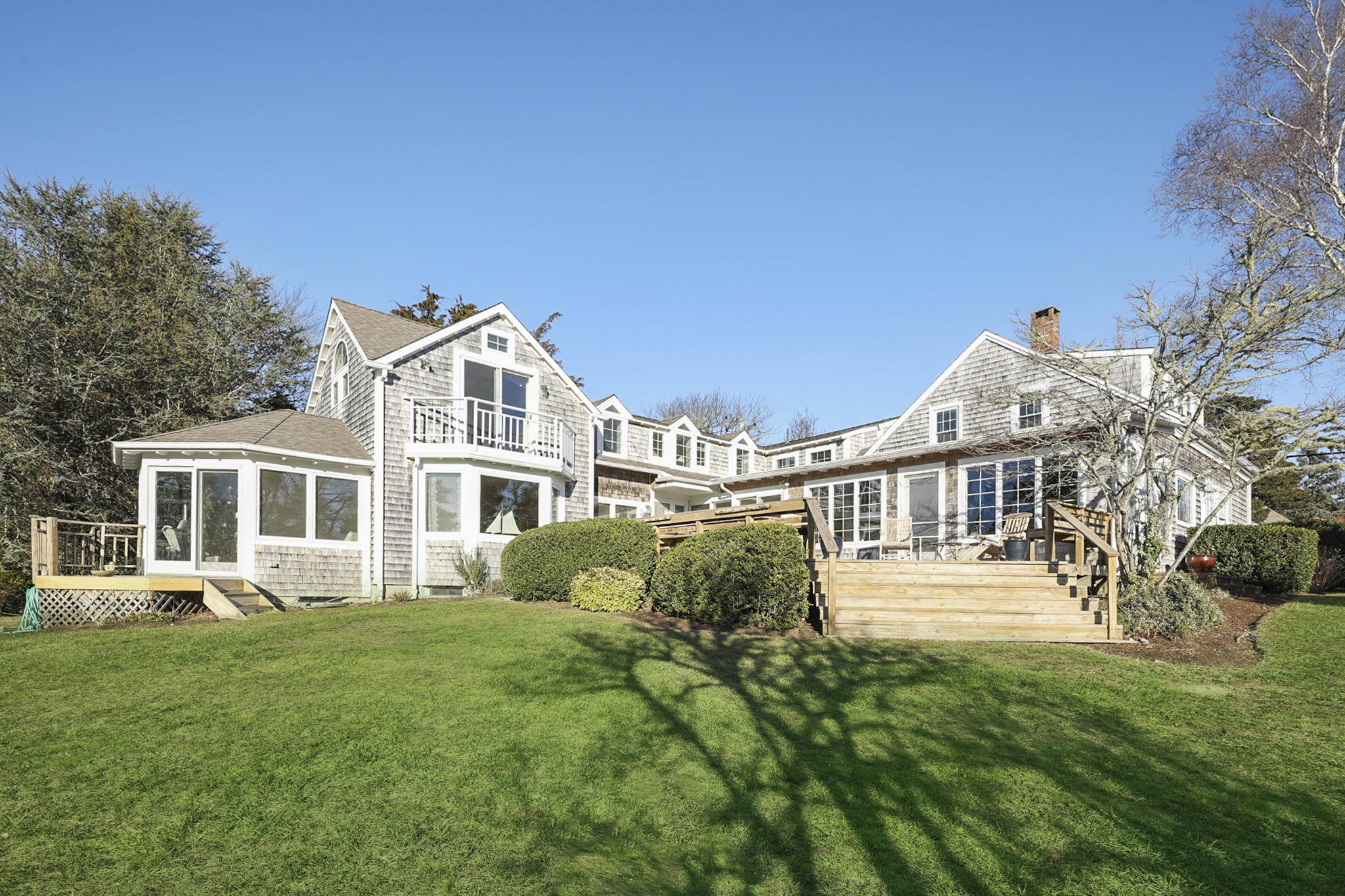 145 Barley Neck Road Orleans, MA 02653 - Photo 34 of 39 a front view of a house with a garden