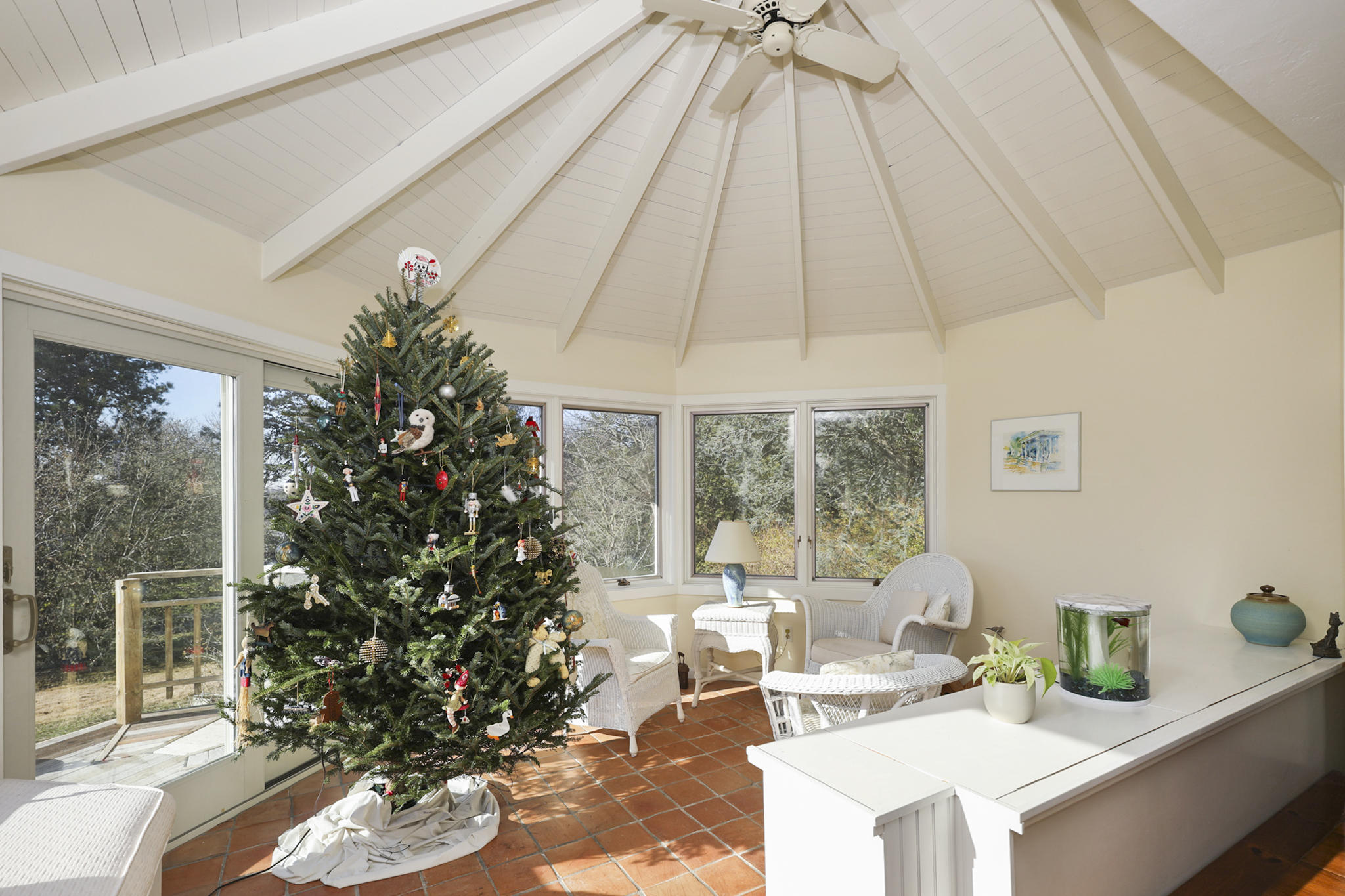 145 Barley Neck Road Orleans, MA 02653 - Photo 4 of 39 a dining room with a large window and table