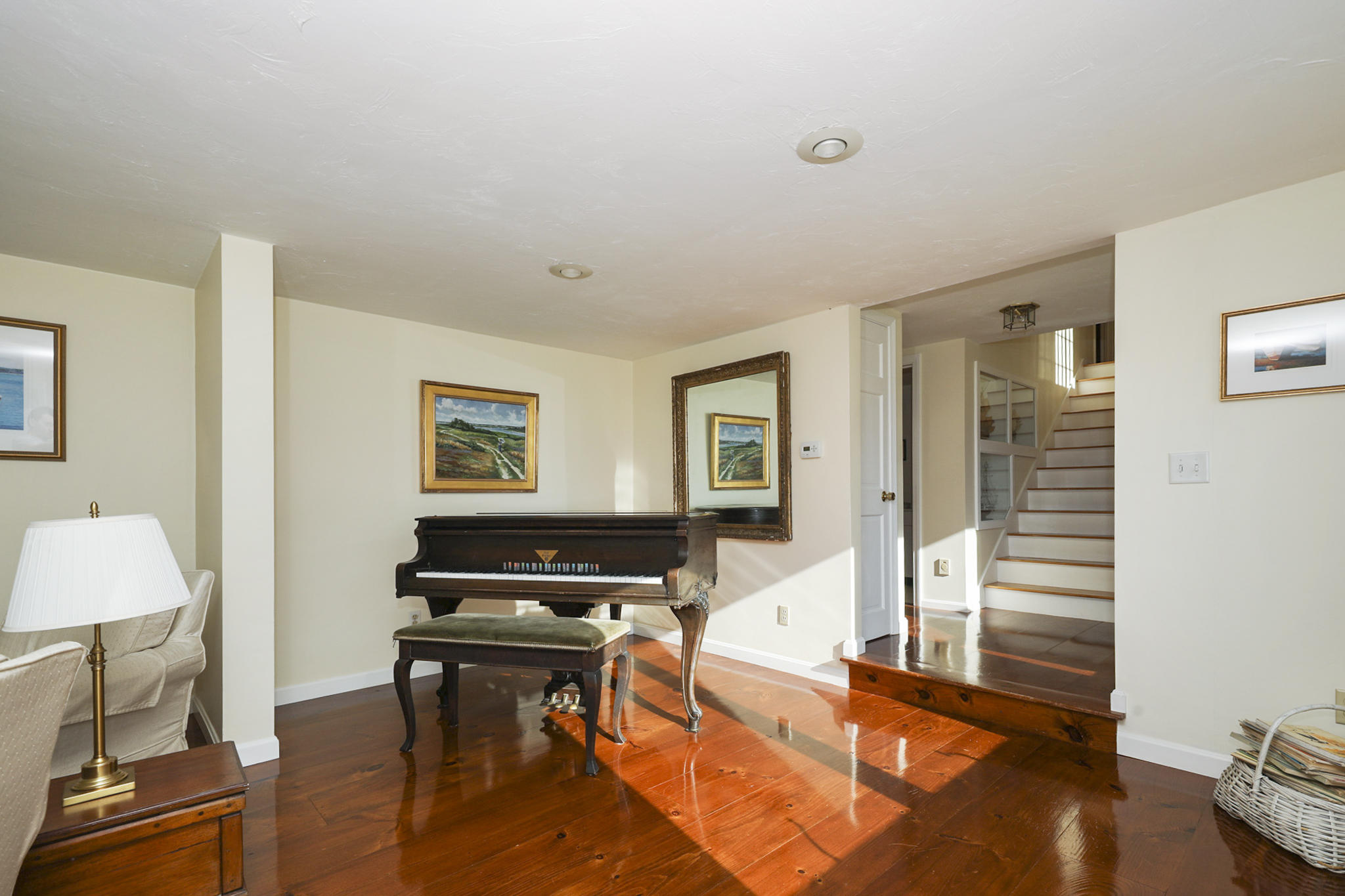 145 Barley Neck Road Orleans, MA 02653 - Photo 5 of 39 a living room with furniture a rug and a window
