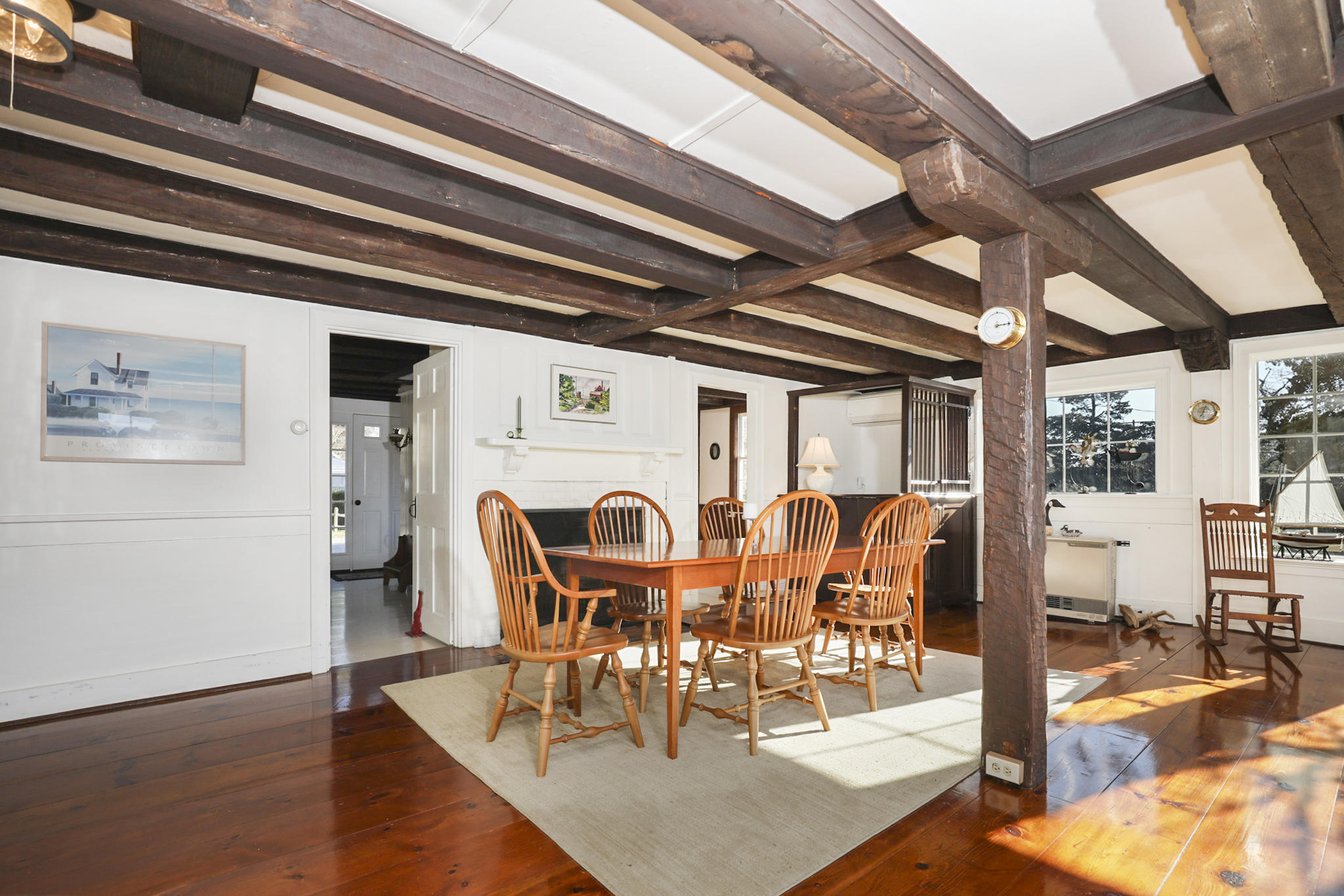 145 Barley Neck Road Orleans, MA 02653 - Photo 7 of 39 a dining hall with stainless steel appliances kitchen island granite countertop a dining table and chairs with the granite countertops