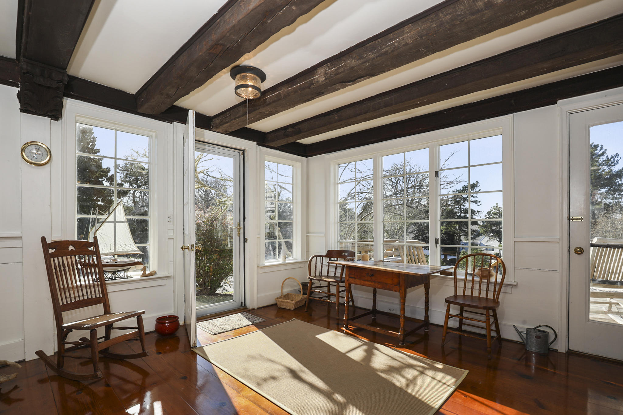 145 Barley Neck Road Orleans, MA 02653 - Photo 8 of 39 a living room with furniture and a large window