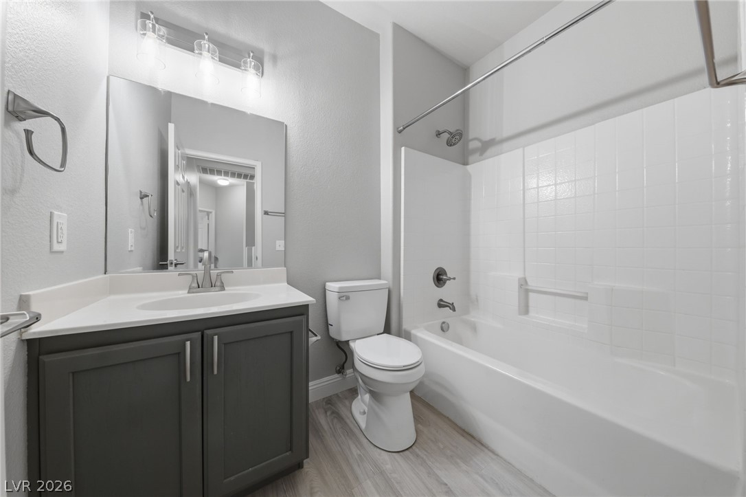 6312 Sandy Ridge Street, Unit 3102 North Las Vegas, NV 89081 - Photo 13 of 31 A well-lit bathroom provides a comfortable and clean space with modern fixtures and a practical layout.