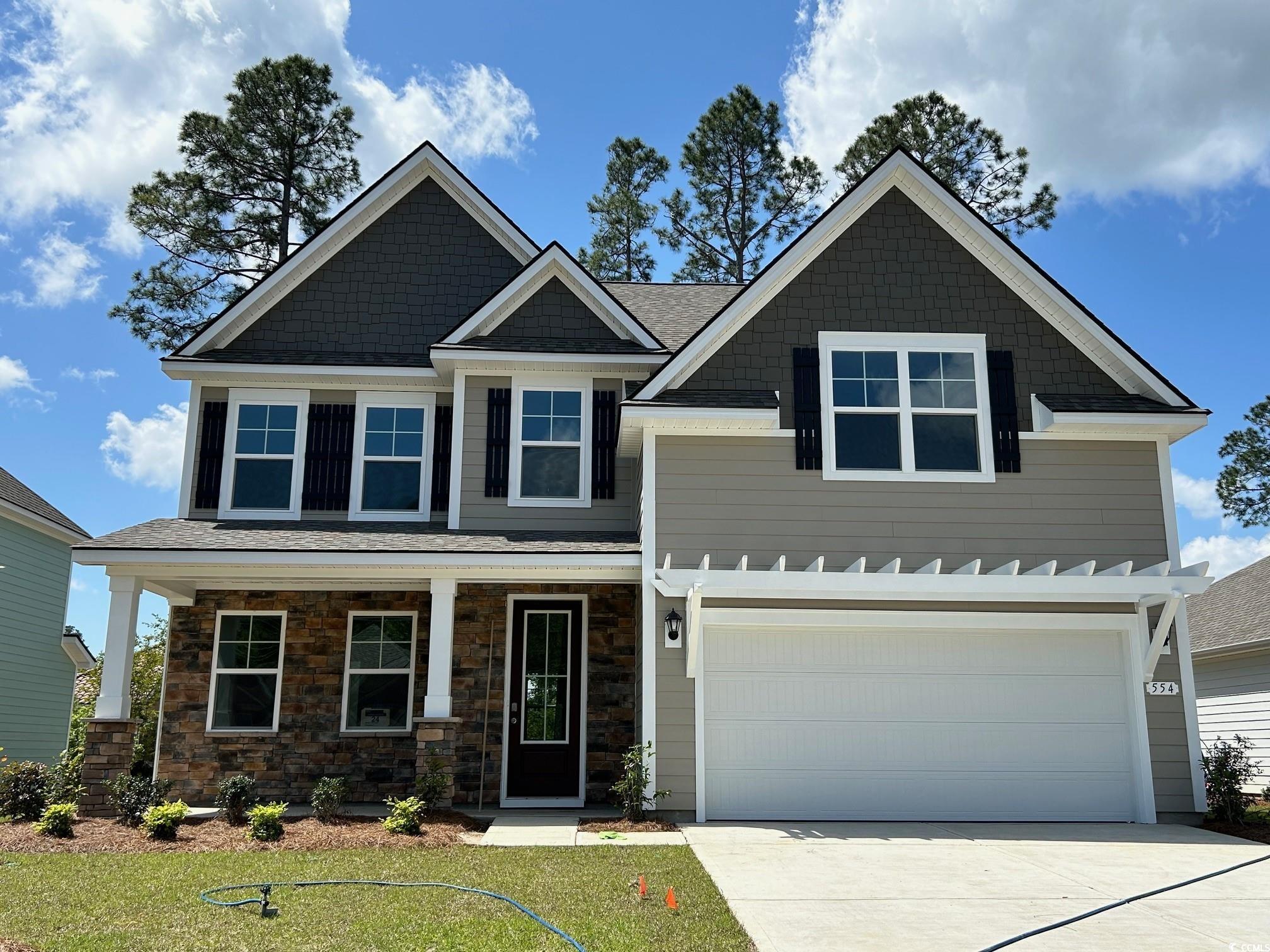 554 Haven View Way Murrells Inlet, SC 29576 - Photo 1 of 24 Craftsman-style home with a front lawn, covered po