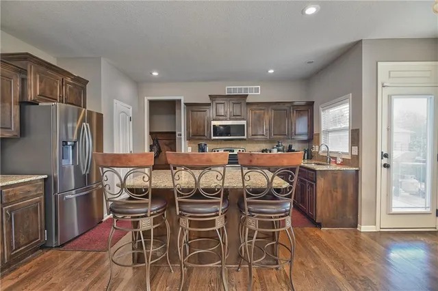 $490,000 | 2427 West Fredrickson Drive, Olathe, KS 66061