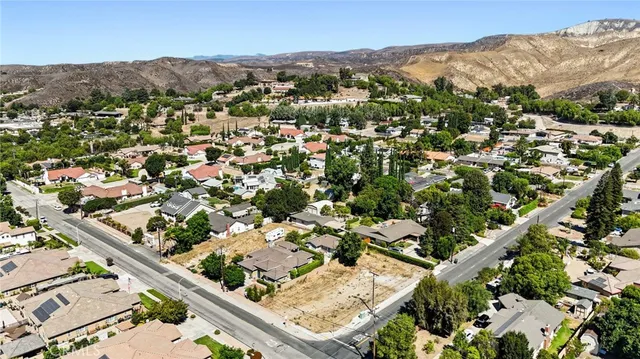 an aerial view of residential house with outdoor space
