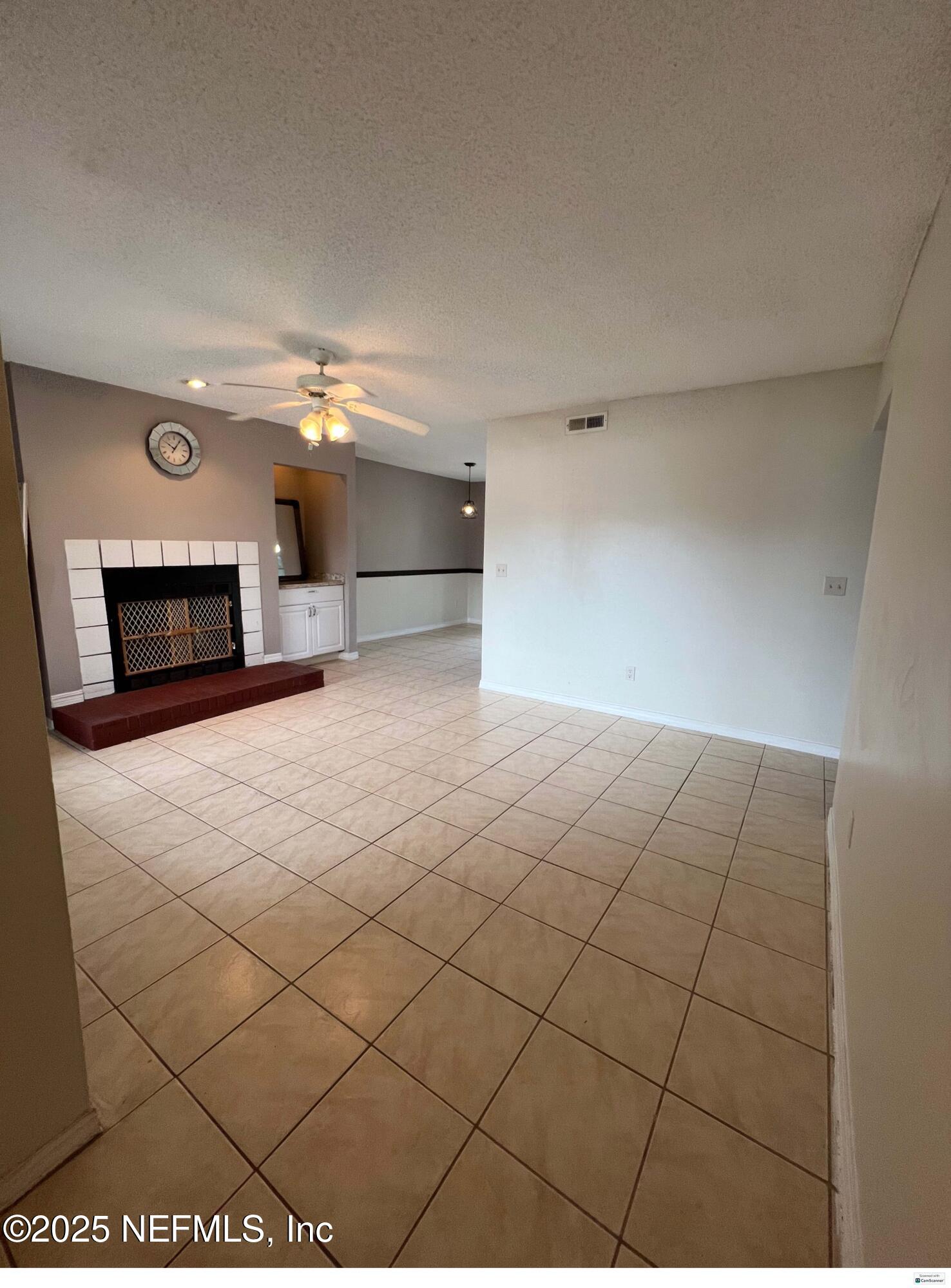 10200 Belle Rive Boulevard, Unit 83 Jacksonville, FL 32256 - Photo 14 of 21 a view of a livingroom with a fireplace