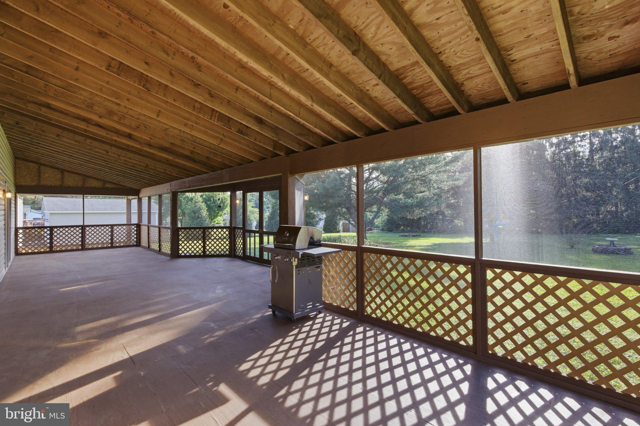 18310 Upper Beckleysville Road Hampstead, MD 21074 - Photo 42 of 67 Spacious screened porch for outdoor living.