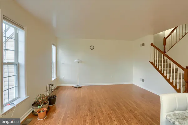 a view of kitchen with table and chairs