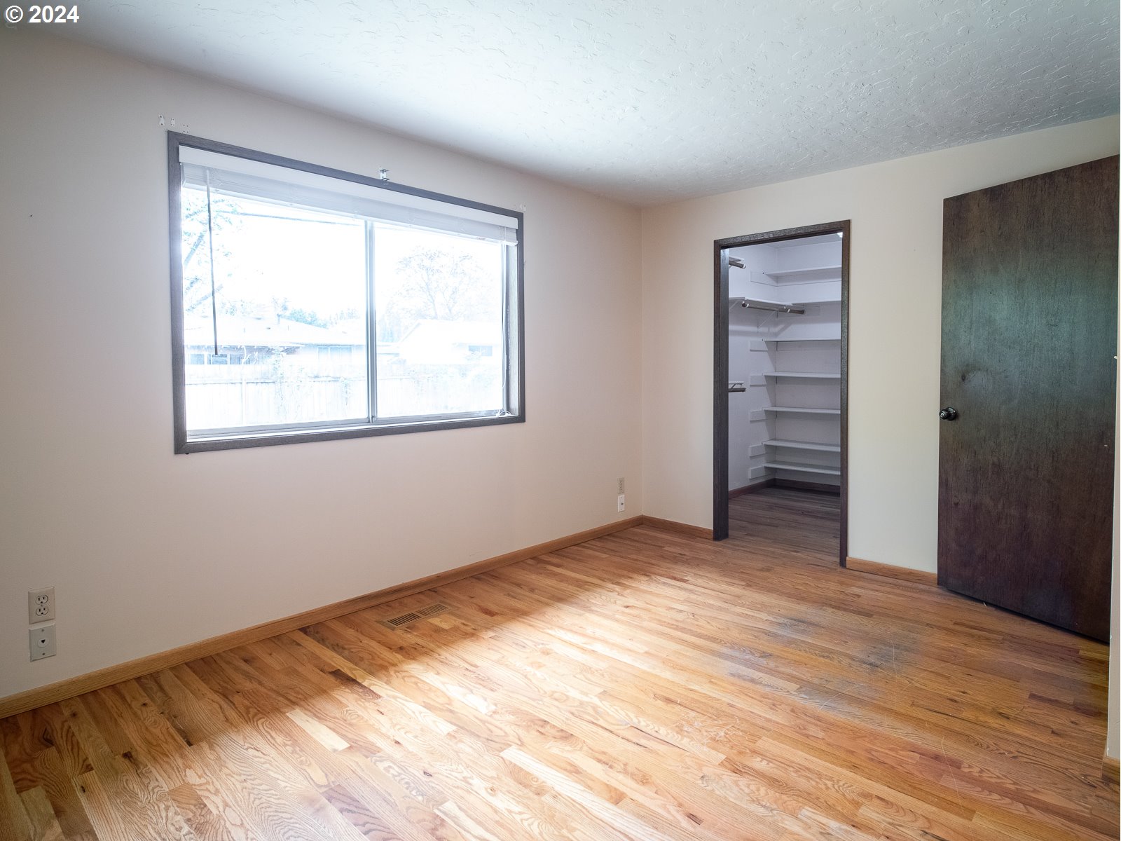 3238 Southeast 176th Place Portland, OR 97236 - Photo 17 of 31 a view of an empty room with a window
