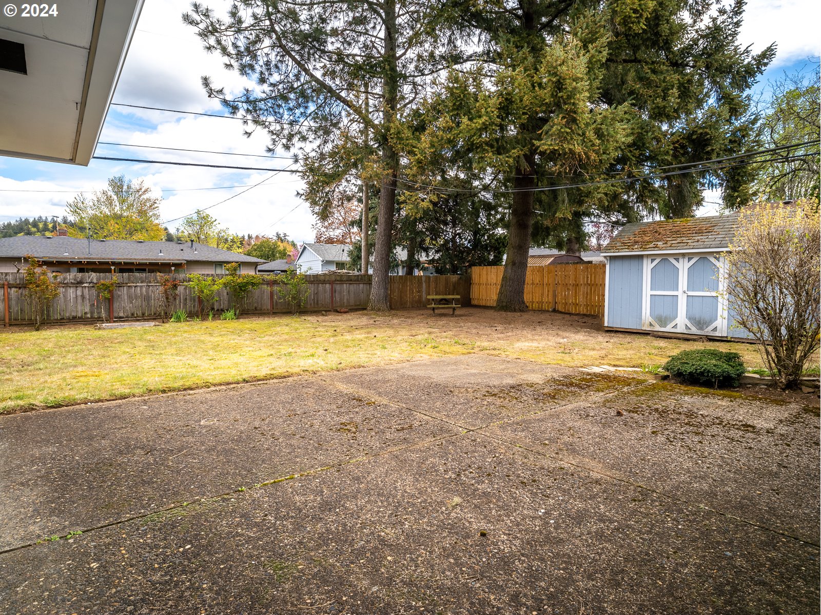 3238 Southeast 176th Place Portland, OR 97236 - Photo 22 of 31 a view of a swimming pool with an outdoor space and seating area