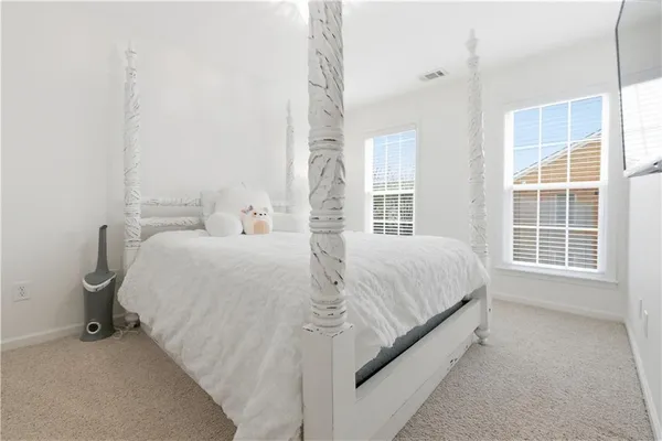 a work room with furniture and a window