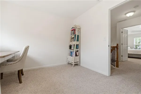 a kitchen with stainless steel appliances granite countertop a sink dishwasher a stove and a microwave oven with wooden floor